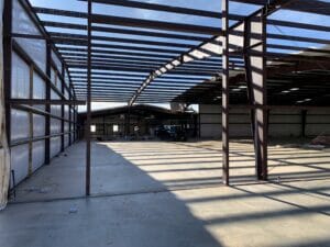 Steel Frame Building Progress Photo In Industrial Setting