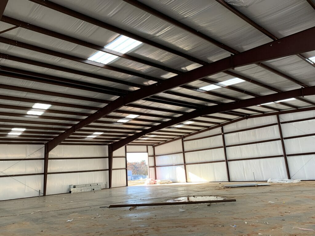 Interior View Of Pre-Engineered Metal Building With High Clearance Steel Beams