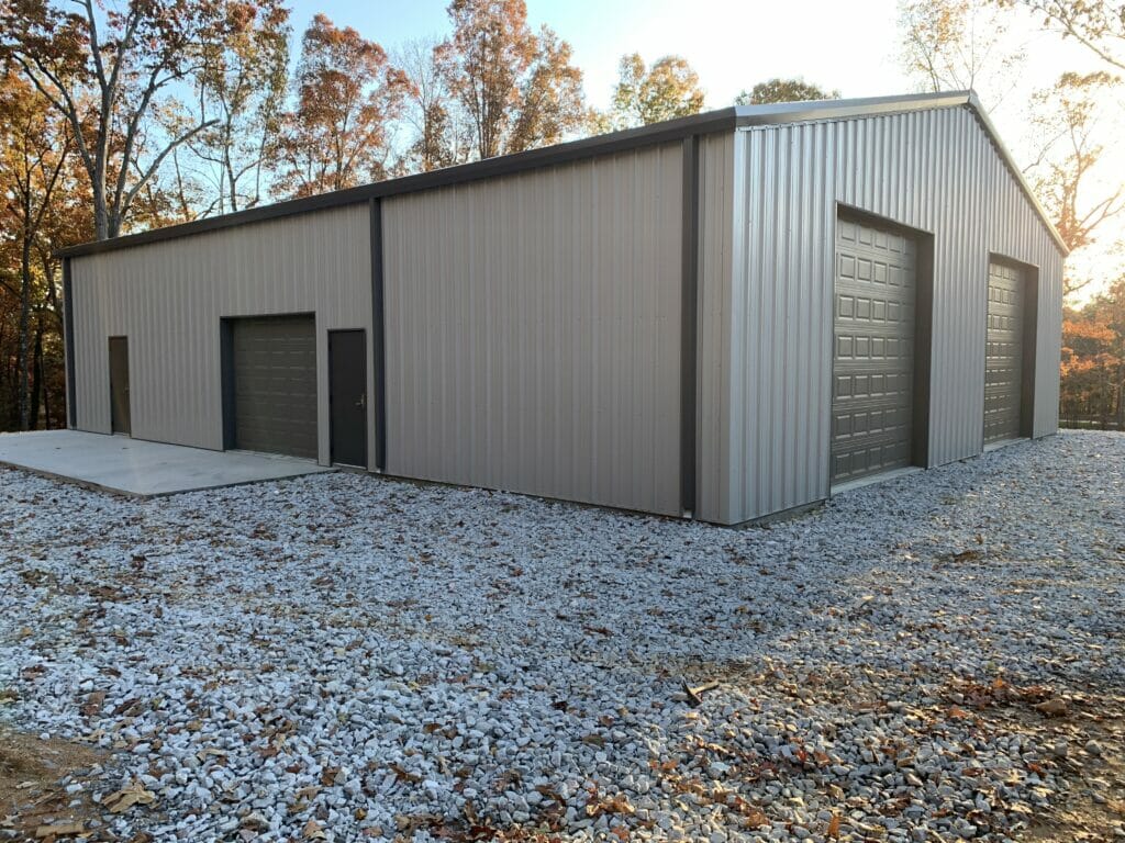 Pre-Engineered Metal Garage Building With Roll Up Garage Door, And Standard Doors