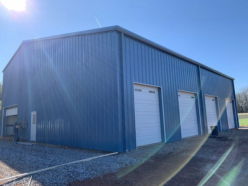 prefabricated steel building with large roll up doors - multi bay