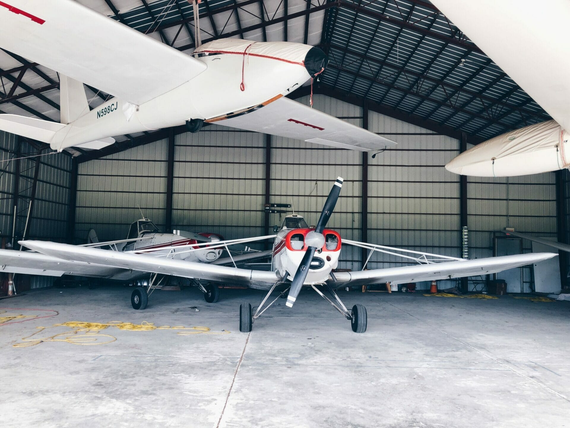 airplane hangar steel building with aircraft